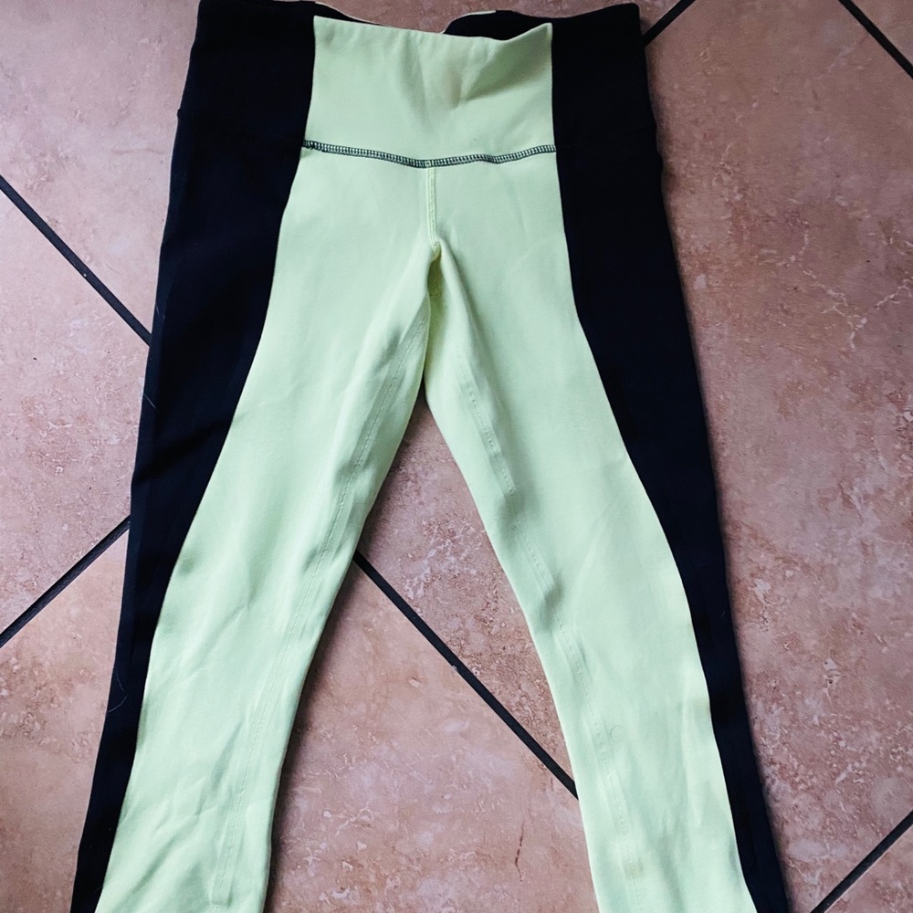 Lululemon wunder under black neon green pants